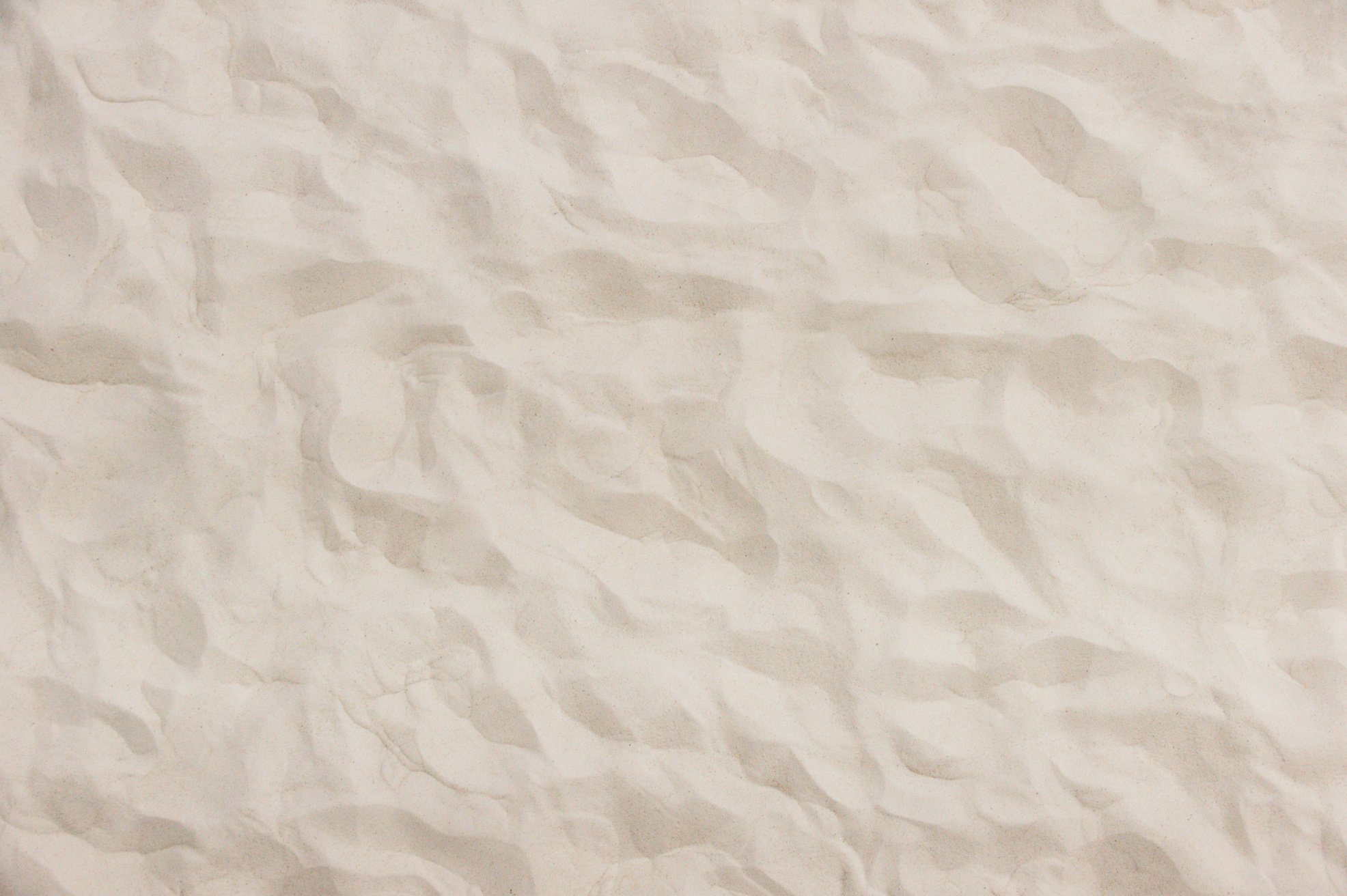 Sand Texture. Brown sand. Background from fine sand. Sand background